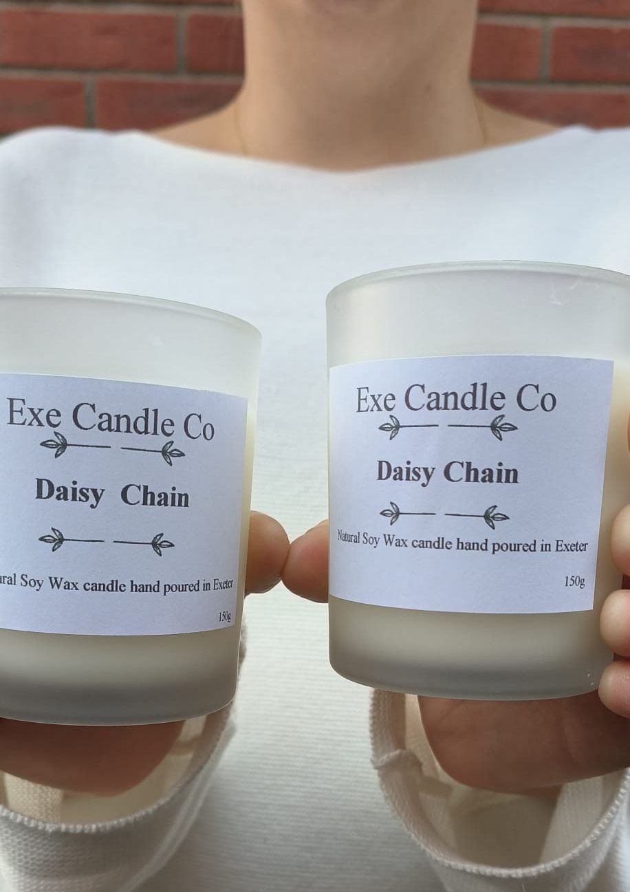Close up of Daisy, Daisy Chain, soy wax candle, soy wax melts, scented candle and wax tarts. Luxury soy wax candle